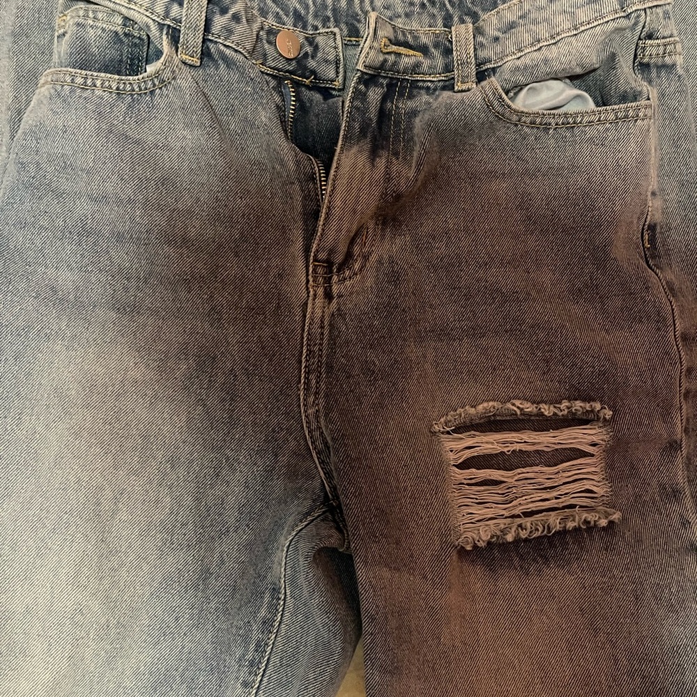 Distressed Blue Jeans